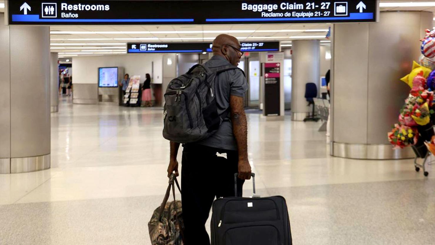 Francius St. Alma, from Miami, was among the passengers of the first evacuation flight out of Cap-Haitien, Haiti, which landed Sunday at Miami International Airport.