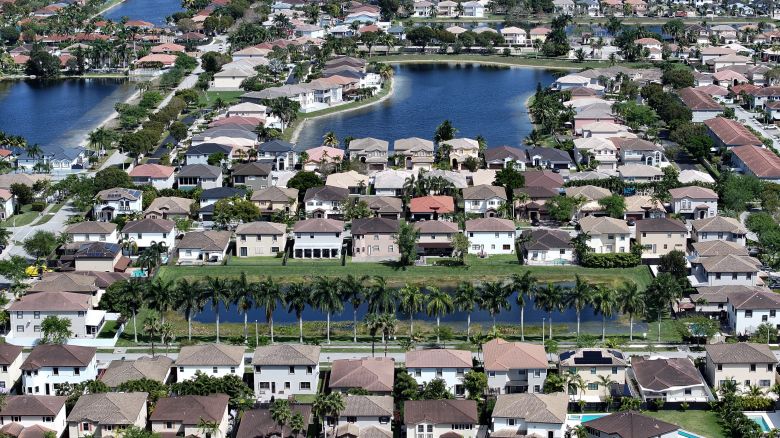 In an aerial view, homes sit on lots in a residential neighborhood on March 15, 2024, in Miami, Florida.