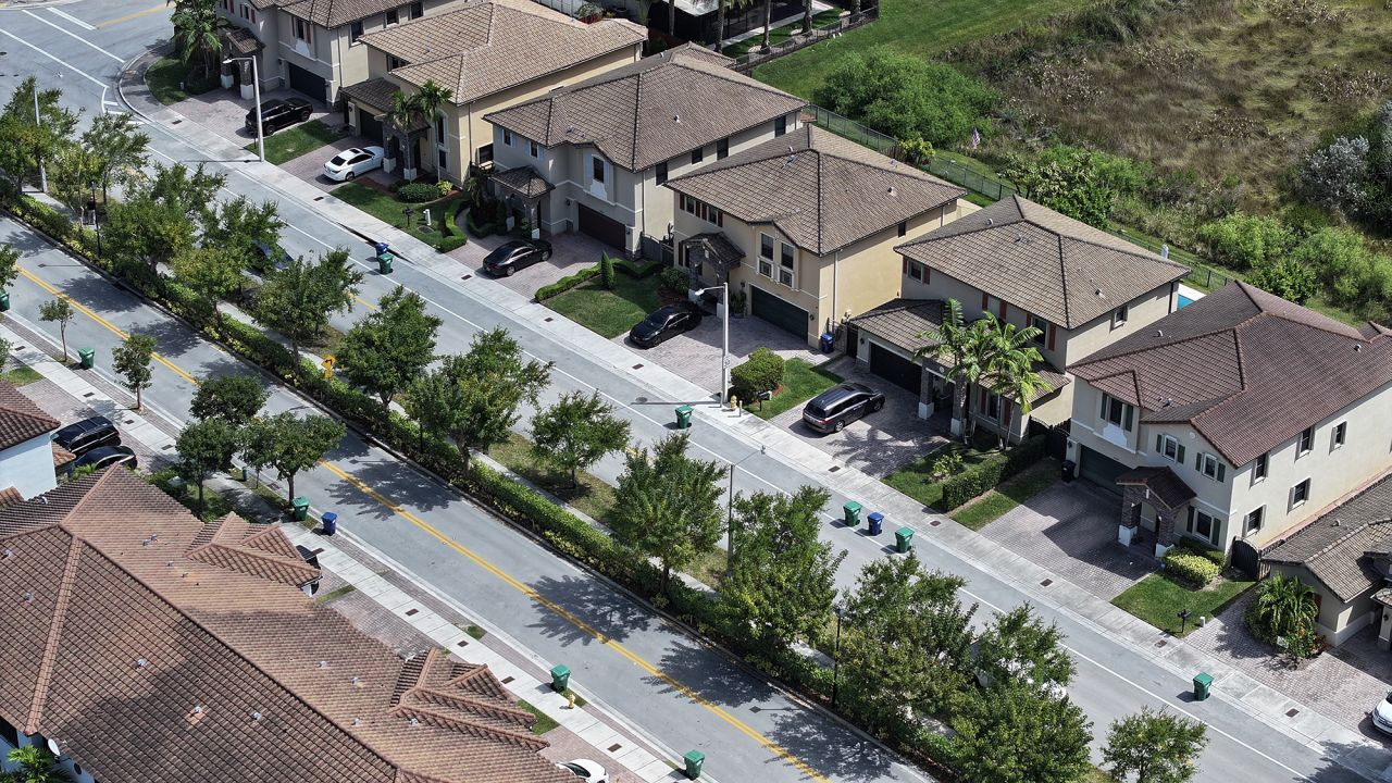 In an aerial view, homes sit on lots in a residential neighborhood on March 15, 2024, in Miami, Florida.