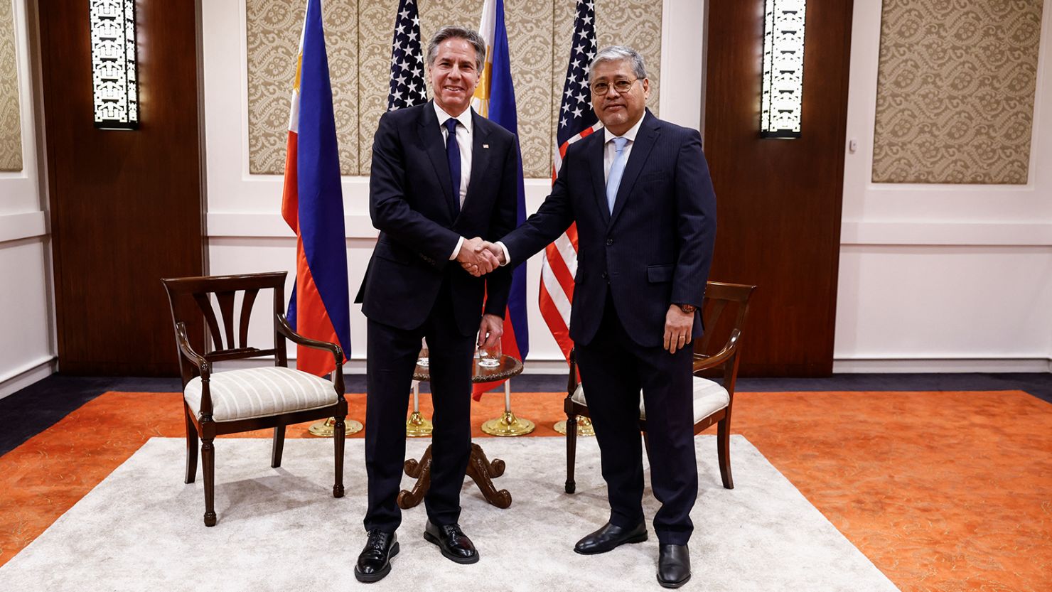 US Secretary of State Antony Blinken shakes hands with Philippine Secretary of Foreign Affairs Enrique Manalo in Manila on March 19, 2024.