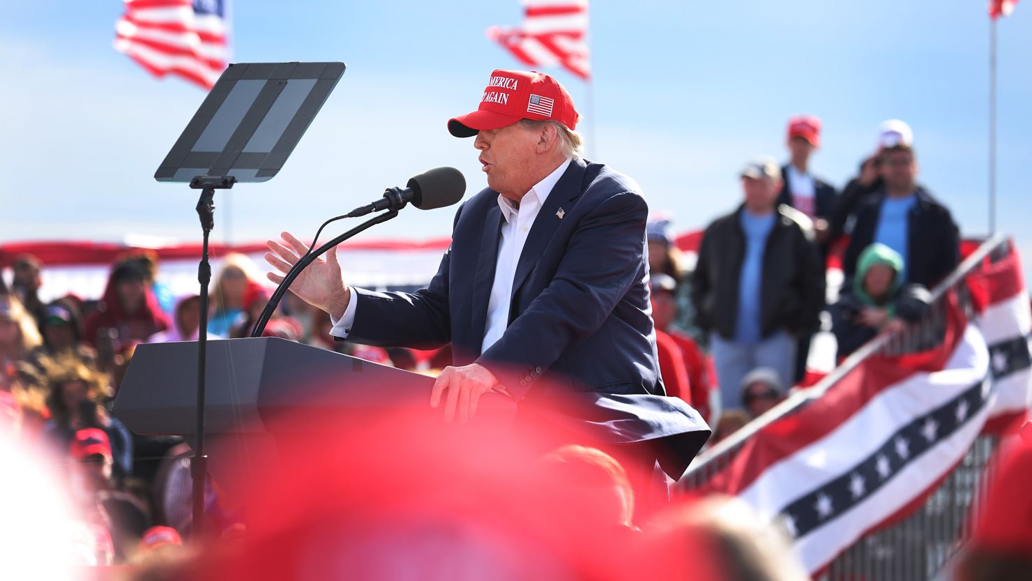 Republican presidential candidate former President Donald Trump speaks to supporters during a rally at the Dayton International Airport on March 16, 2024, in Vandalia, Ohio.