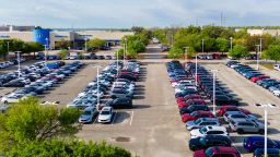 In an aerial view, cars sit on the lot at the Howdy Honda dealership on March 18, 2024 in Austin, Texas.