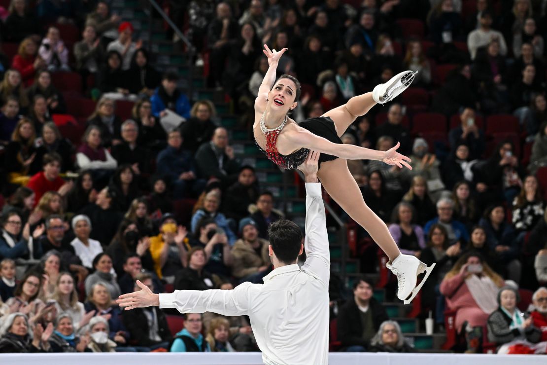Stellato-Dudek and Deschamps captivate the audience during their world championship free skate Thursday. The crowd erupted in a standing ovation before the pair even finished their performance.