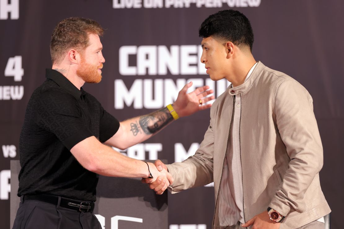 Álvarez and Munguía shake hands during a media conference to preview their super middleweight fight at The Beverly Hills Hotel on March 19, 2024.