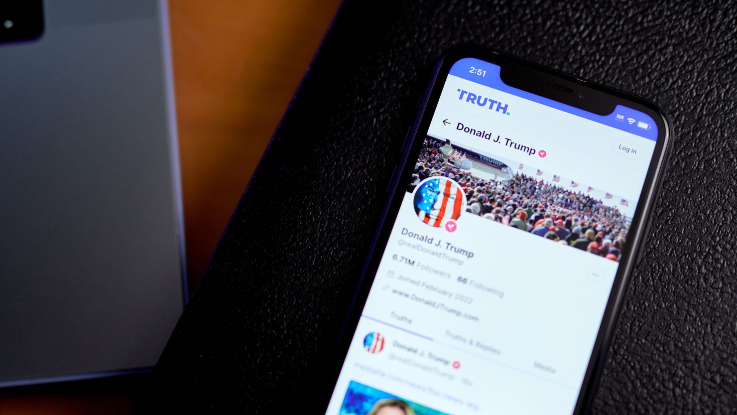 The Truth Social website on a smartphone arranged in New York on Friday, March 22, 2024.