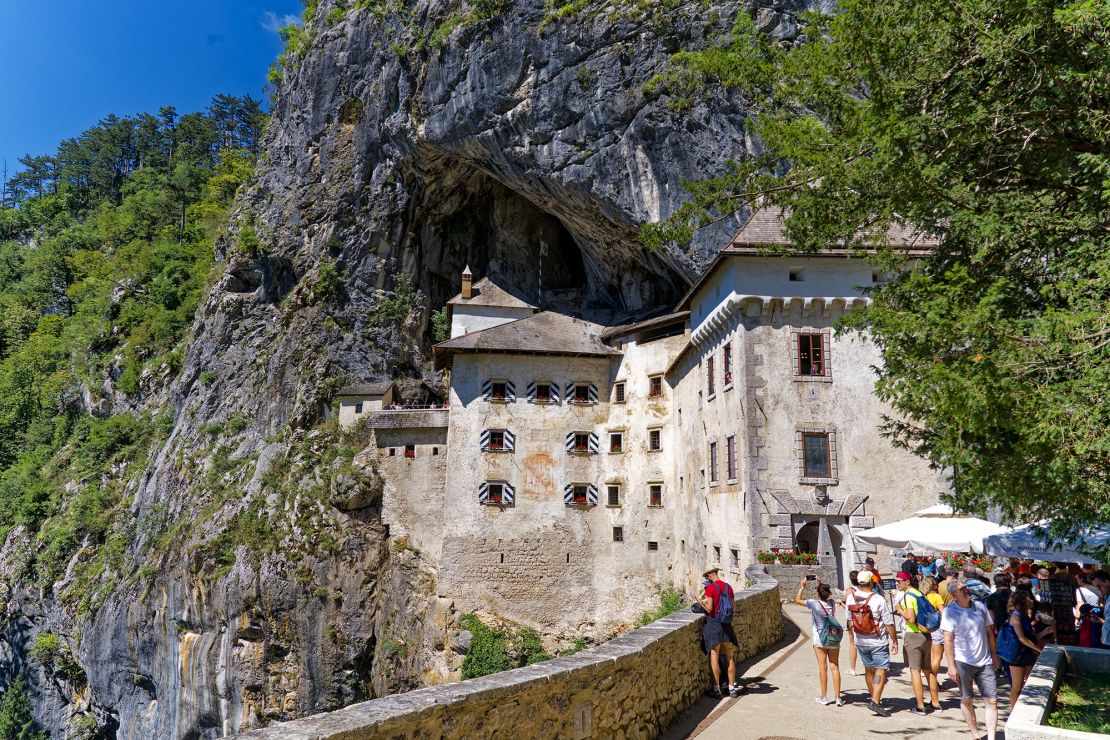 Predjama Castle is built into the mouth of a cliffside cave.