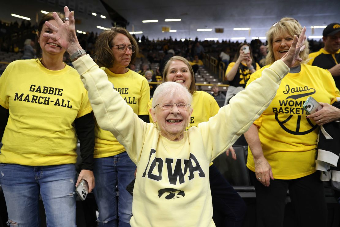 IOWA CITY, IOWA - MARCH 23: Dee Vanderhoef, an Iowa Hawkeyes fan and season ticket holder since the 1970s, cheers prior to tipoff against the Holy Cross Crusaders during the first round of the 2024 NCAA Women's Basketball Tournament held at Carver-Hawkeye Arena on March 23, 2024 in Iowa City, Iowa. (Photo by Rebecca Gratz/NCAA Photos via Getty Images)