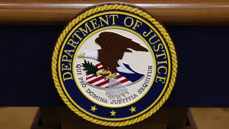 WASHINGTON, DC - MARCH 21: A seal for the Department of Justice is seen on a podium ahead of a news conference with U.S. Attorney General Merrick Garland at the Department of Justice Building on March 21, 2024 in Washington, DC. During the news conference, Garland and DOJ officials are expected to make an announcement about ongoing antitrust investigations. (Photo by Anna Moneymaker/Getty Images)