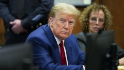 Former US President Donald Trump and attorney Susan Necheles attend a hearing to determine the date of his trial for allegedly covering up hush money payments linked to extramarital affairs, at Manhattan Criminal Court in New York City on March 25, 2024.