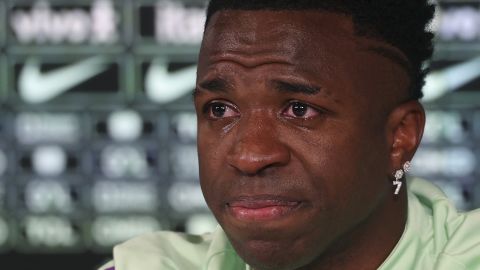 Brazil's forward Vinicius Junior cries as he gives a press conference on the eve of the international friendly football match between Spain and Brazil at the Ciudad Real Madrid training ground in Valdebebas, outskirts of Madrid, on March 25, 2024. Spain arranged a friendly against Brazil at the Santiago Bernabeu under the slogan "One Skin" to help combat racism. (Photo by Pierre-Philippe MARCOU / AFP) (Photo by PIERRE-PHILIPPE MARCOU/AFP via Getty Images)