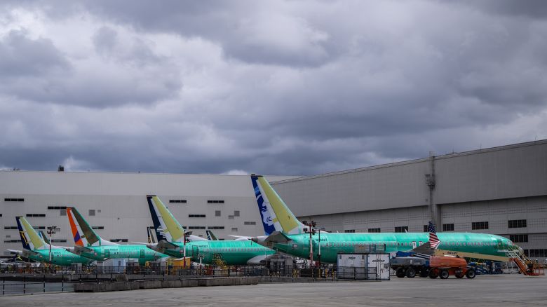 Boeing 737 MAX airplanes are pictured outside a Boeing factory on March 25, 2024 in Renton, Washington. A mid-air door plug blowout on an Alaska Airlines flight and subsequent grounding of flights precipitated a management shakeup at Boeing.