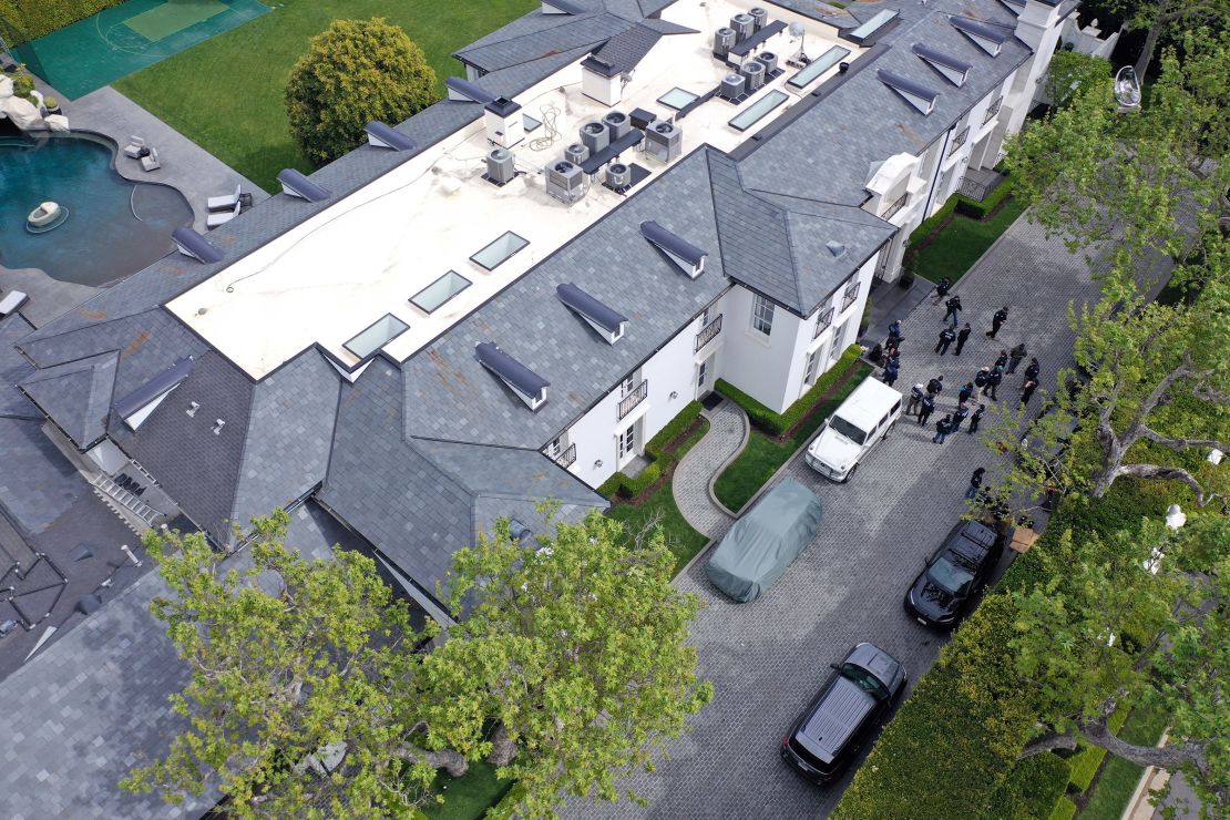 The home of Sean "Diddy" Combs is seen during a raid by federal law enforcement agents on March 25 in Los Angeles.