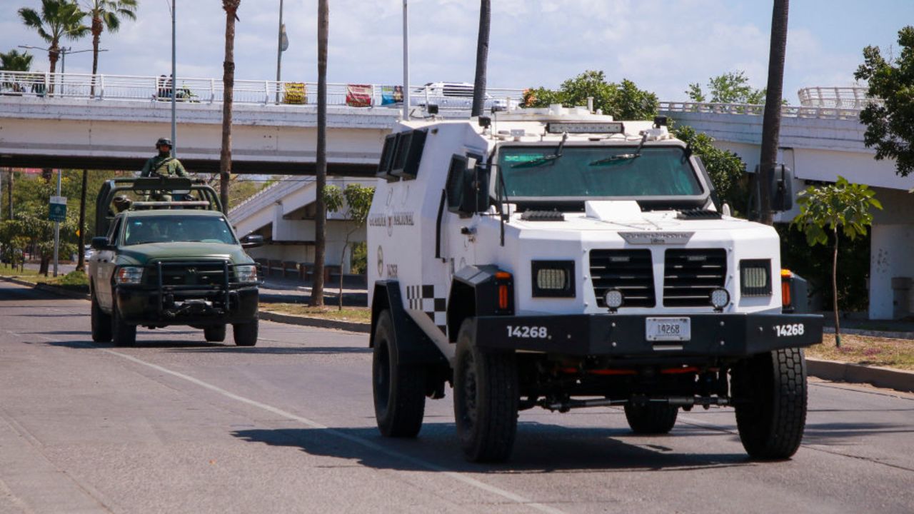 of the Mexican Army and National Guard patrol the streets in Culiacan, Sinaloa State, Mexico, on March 25, 2024, a day after a clash between of the Mexican National Guard and armed civilians. Mexican President Andres Manuel Lopez Obrador said Monday that a mass kidnapping of dozens of people in a northwestern cartel heartland was linked to a dispute between criminal groups. According to authorities, 58 of the 66 people reportedly kidnapped on Friday in the Sinaloa state capital Culiacan have been located. (Photo by Ivan MEDINA / AFP) (Photo by IVAN MEDINA/AFP via Getty Images)