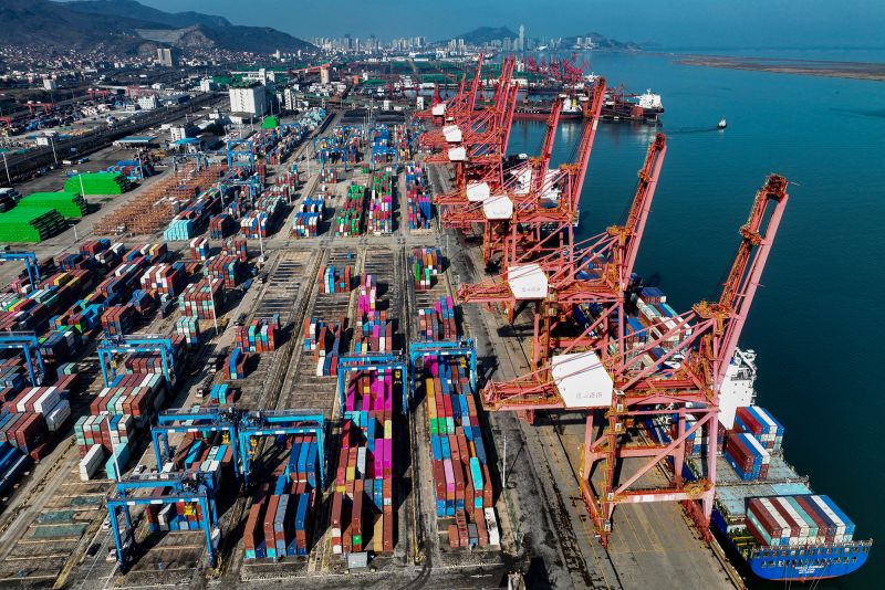 This photo shows an aerial view of shipping containers stacked at the Lianyungang Port in Lianyungang, in eastern China's Jiangsu province on March 26, 2024.