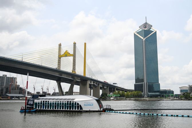 The Ocean Cleanup's Interceptor, which captures floating plastic and trash before it reaches the ocean, is seen during a press visit on the Chao Phraya river in Bangkok on March 26, 2024.