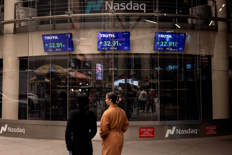 Screens displaying Truth Social stock information outside the Nasdaq MarketSite in New York, US, on Tuesday, March 26, 2024. The stock market bounced back, with traders adjusting their positions in the final few days of a banner quarter. Photographer: Yuki Iwamura/Bloomberg via Getty Images