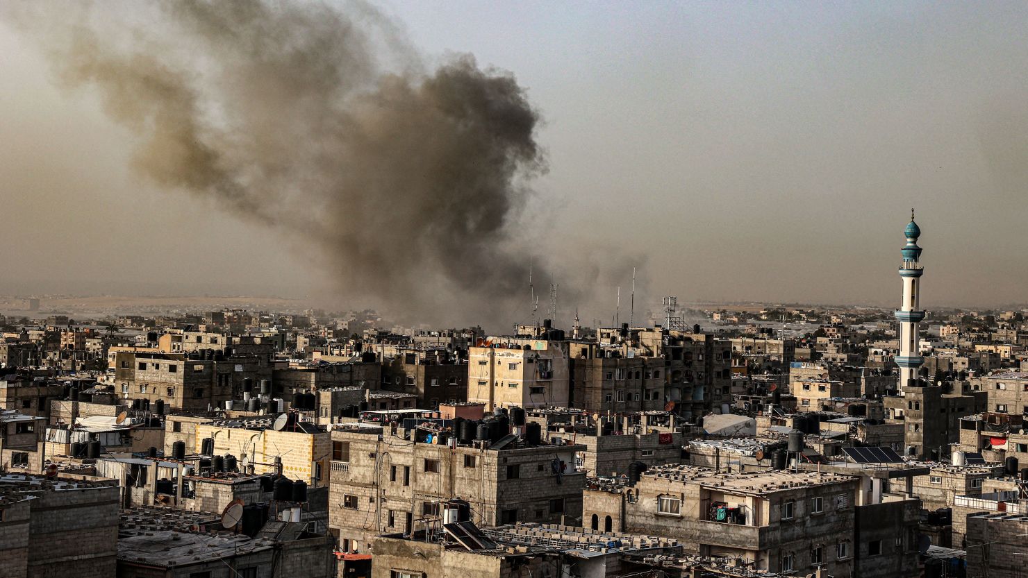 Smoke billows over buildings following Israeli bombardment in Rafah in the southern Gaza Strip on March 27, 2024, amid the ongoing conflict between Israel and the Palestinian militant group Hamas.