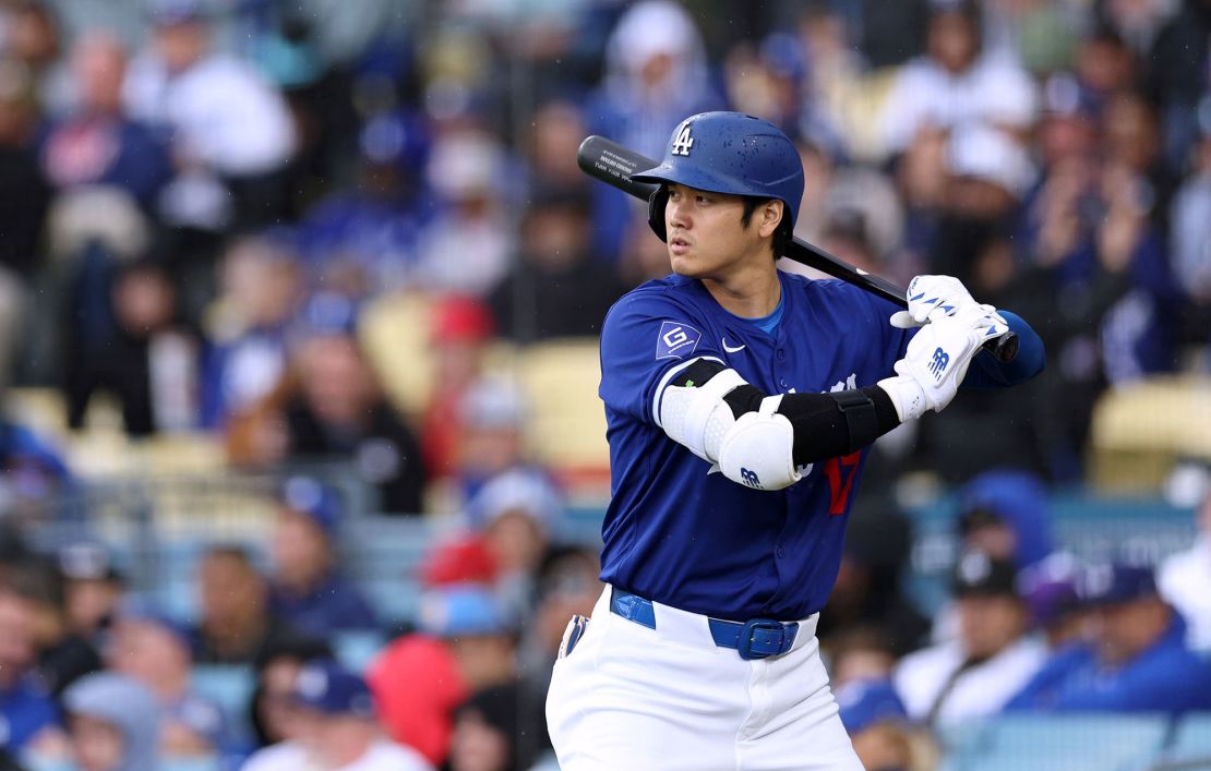 Ohtani prepares for a pitch during the Dodgers' preseason game against the Los Angeles Angels.
