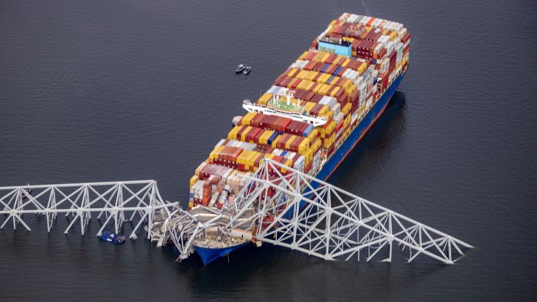 BALTIMORE, MARYLAND - MARCH 26: In an aerial view, cargo ship Dali is seen after running into and collapsing the Francis Scott Key Bridge on March 26, 2024 in Baltimore, Maryland. Rescuers are searching for at least seven people, authorities say, while two others have been pulled from the Patapsco River. (Photo by Tasos Katopodis/Getty Images)