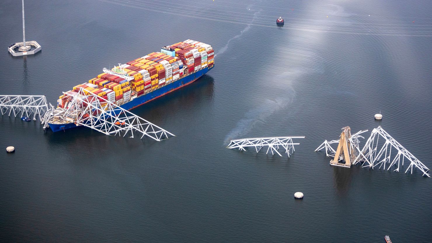 In an aerial view, the cargo ship Dali is seen after running into and collapsing the Francis Scott Key Bridge on March 26, 2024, in Baltimore.