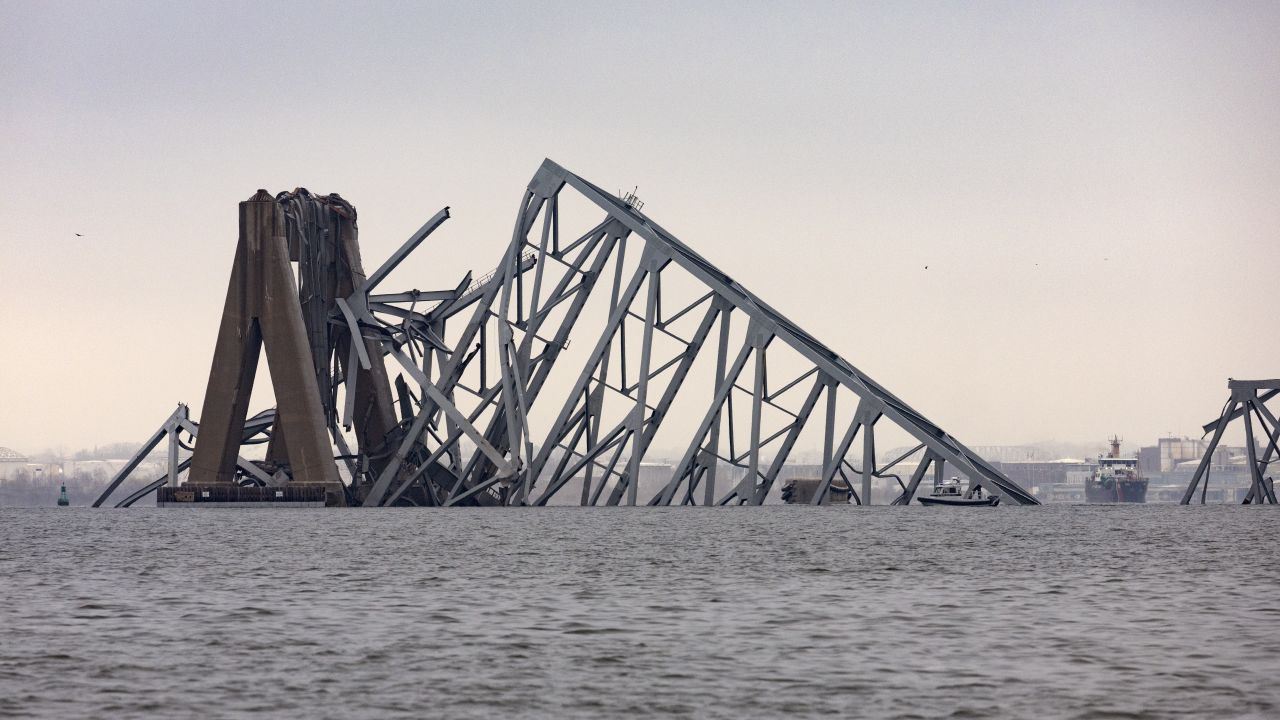 Workers continue to investigate and search for victims after the cargo ship Dali collided with the Francis Scott Key Bridge causing it to collapse yesterday, on March 27, 2024 in Baltimore, Maryland.