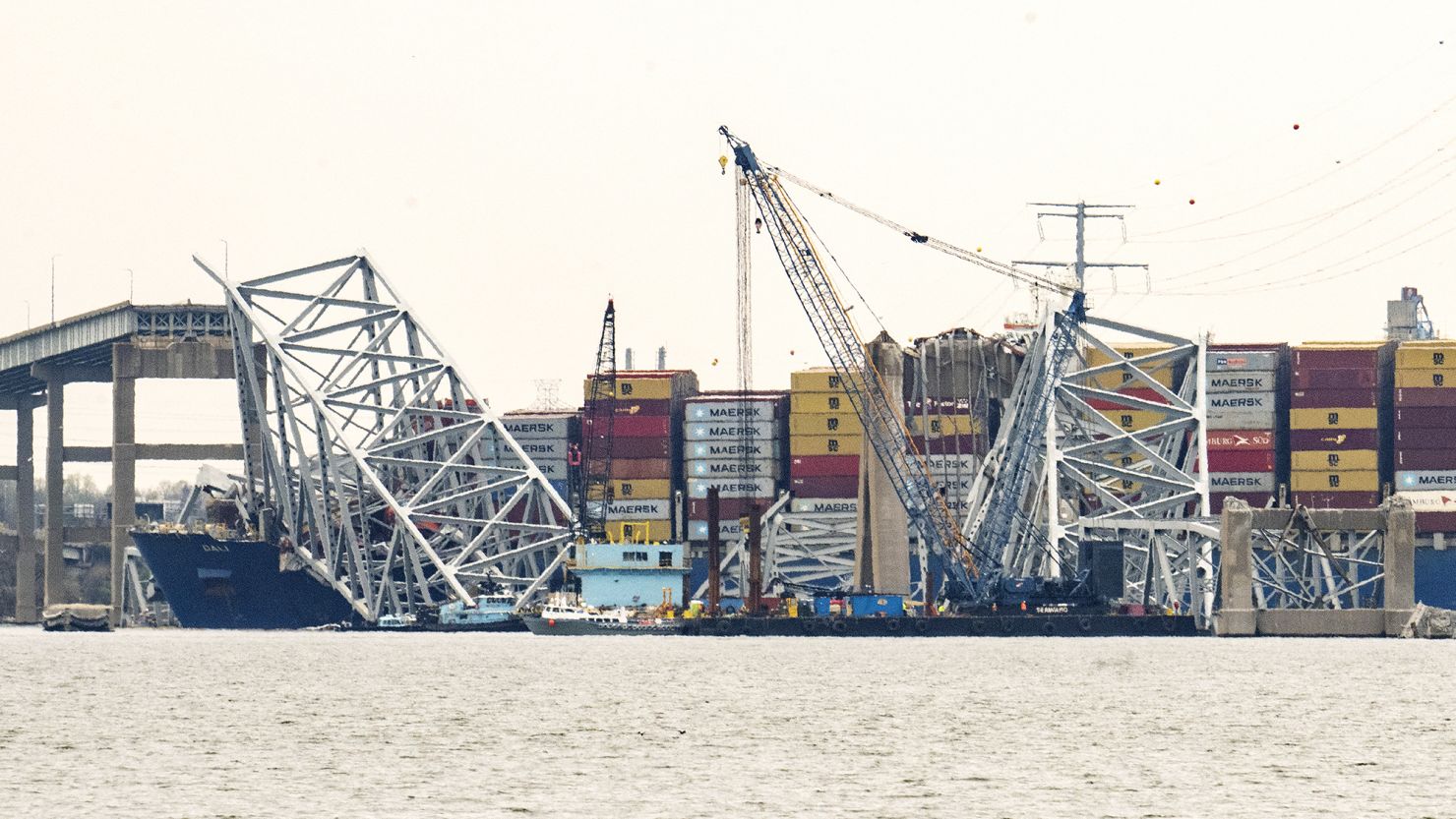 Cranes begin the cleanup of the collapsed Francis Scott Key Bridge and the container ship Dali in Baltimore on March 30.