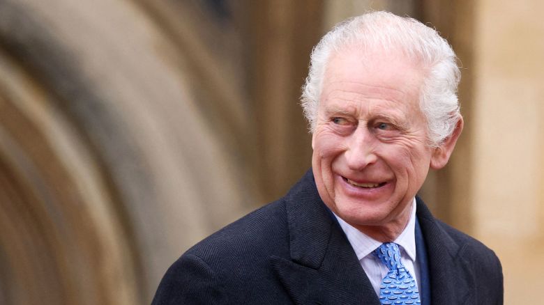 King Charles III smiles as he leaves St. George's Chapel in Windsor on Easter Sunday morning.