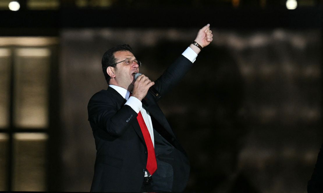 Istanbul's mayor and main opposition Republican People's Party (CHP) candidate Ekrem Imamoglu makes a speech in front of supporters celebrating outside the main municipality building following municipal elections across Turkey, in Istanbul on March 31, 2024. Ekrem Imamoglu's second victory in an Istanbul city election on March 31 cemented his standing as Turkey's top opposition leader in a new blow to President Recep Tayyip Erdogan and his ruling party. The main Turkish CHP opposition party claimed victory in the mayoral race in the capital Ankara as the party built a solid lead in the count for control of Istanbul, according to partial results from local elections, on March 31, 2024. Some 61 million voters picked mayors across Turkey's 81 provinces, as well as provincial council members and other local officials. (Photo by OZAN KOSE / AFP) (Photo by OZAN KOSE/AFP via Getty Images)
