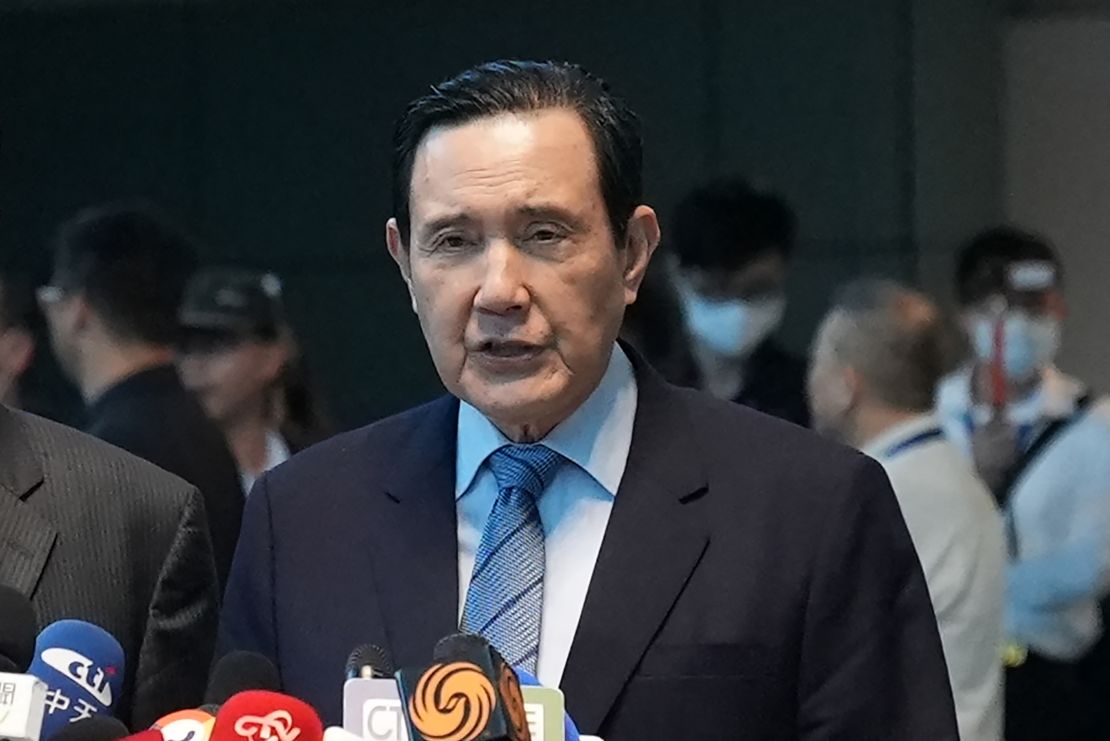 Former Taiwan President Ma Ying-jeou (center) speaks to reporters before his visit to China at Taoyuan International Airport in Taoyuan on April 1, 2024. Former Taiwan President Ma Ying-jeou flew to China on April 1 in what he described as a 