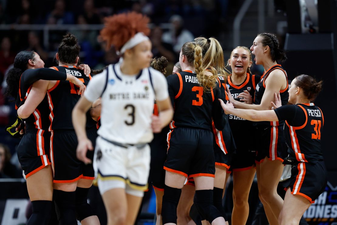 The Oregon State Beavers celebrate after defeating the Notre Dame Fighting Irish.