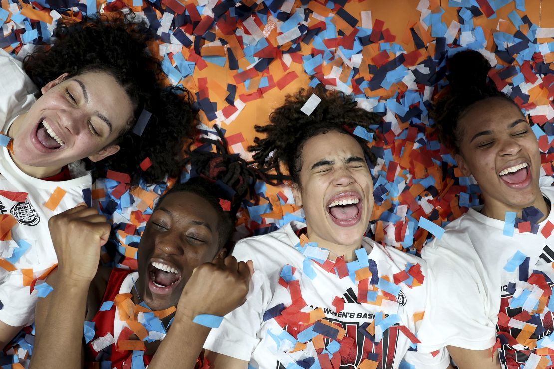 NC State Wolfpack players celebrate after defeating the Texas Longhorns.