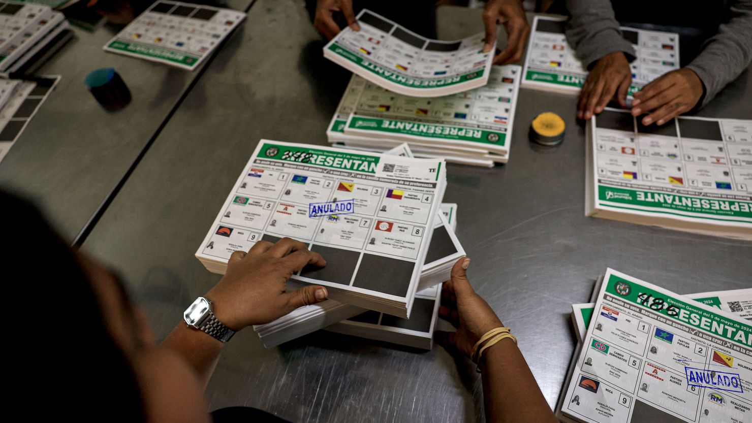 Workers prepare ballots for the upcoming election at the Electoral Tribunal in Panama, April 4, 2024.