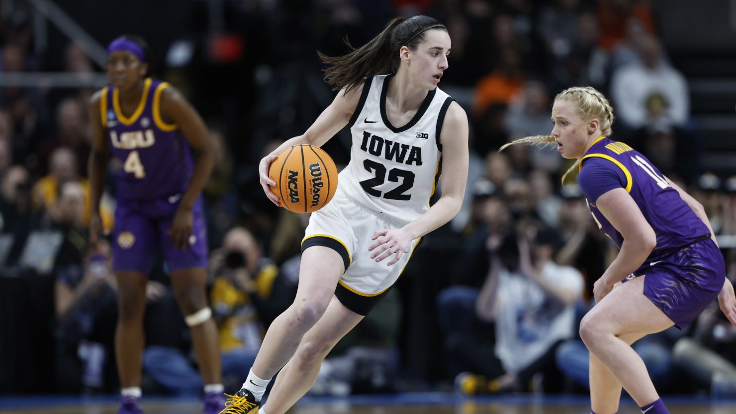 Caitlin Clark of the Iowa Hawkeyes dribbles against Hailey Van Lith of the LSU Tigers at last Monday's NCAA Women's basketball game in Albany, New York.