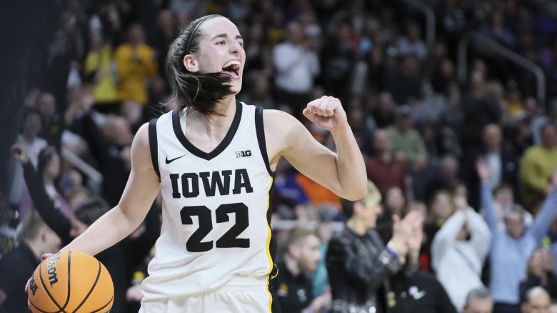 ALBANY, NEW YORK - APRIL 01: Caitlin Clark #22 of the Iowa Hawkeyes celebrates after beating the LSU Tigers 94-47 in the Elite 8 round of the NCAA Women's Basketball Tournament at MVP Arena on April 01, 2024 in Albany, New York. (Photo by Andy Lyons/Getty Images)