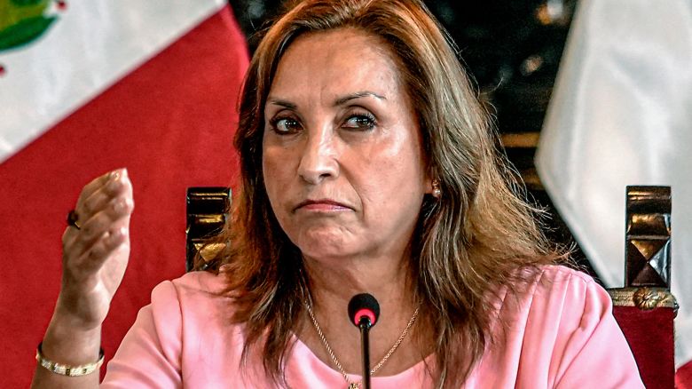 Peru's President Dina Boluarte speaks to members of the press, regarding an investigation into alleged bribes involving Rolex watches, at the government palace in Lima on April 05, 2024.