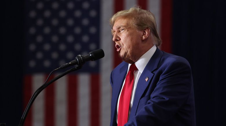 GREEN BAY, WISCONSIN - APRIL 02: Former President Donald Trump speaks to guests at a rally on April 02, 2024 in Green Bay, Wisconsin.  At the rally, Trump spoke next to an empty lectern on the stage and challenged President Joe Biden to debate him. The Wisconsin primary is being held today. (Photo by Scott Olson/Getty Images)