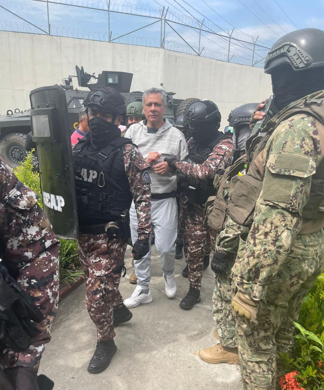 Police detain Glas in Quito, Ecuador on April 6.