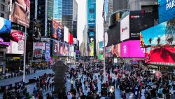 A general view shows visitors and tourists making their way through Times Square in New York City on April 7, 2024. (Photo by Charly TRIBALLEAU / AFP) (Photo by CHARLY TRIBALLEAU/AFP via Getty Images)
