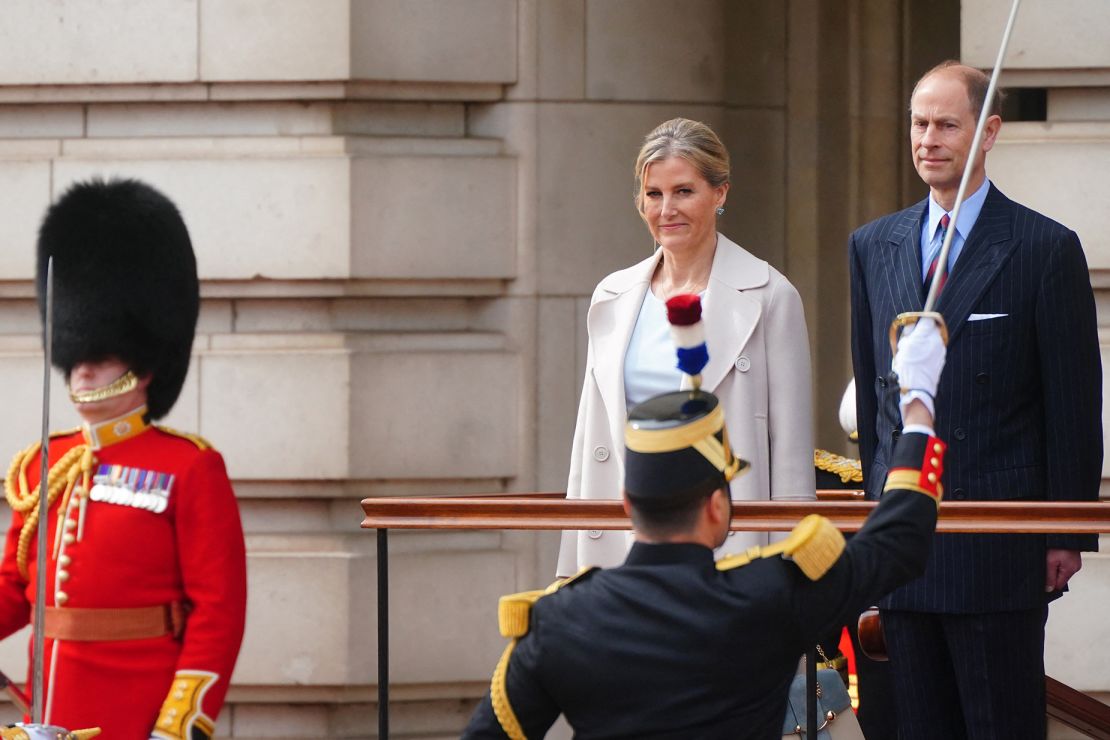 Prince Edward and Sophie, Duchess of Edinburgh react as members of France’s Gendarmerie Garde Republicaine take part in a special Changing of the Guard ceremony at Buckingham Palace in London on April 8.