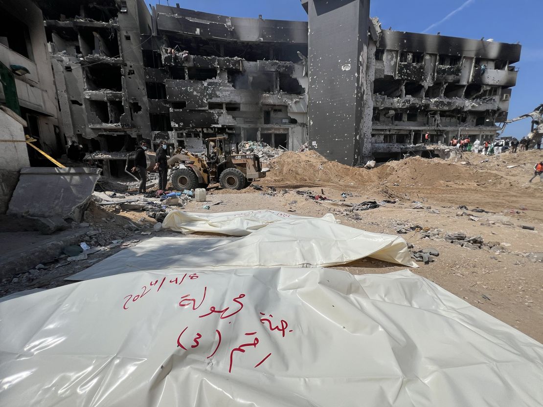 Gazan teams from the health department, civil defense, crime scene investigation, and forensics investigate what remains of Gaza's Al-Shifa Hospital on April 8, 2024.