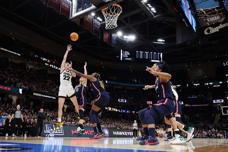 CLEVELAND, OHIO - APRIL 05: Caitlin Clark #22 of the Iowa Hawkeyes in the first half during the NCAA Women's Basketball Tournament Final Four semifinal game against the UConn Huskies at Rocket Mortgage Fieldhouse on April 05, 2024 in Cleveland, Ohio. (Photo by Steph Chambers/Getty Images)