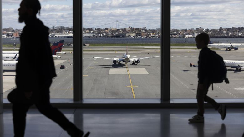 Delta planes at Terminal C of LaGuardia Airport (LGA) in the Queens borough of New York, US, on Sunday, April 7, 2024. Delta Air Lines Inc. is expected to release earnings figures on April 10. Photographer: Angus Mordant/Bloomberg