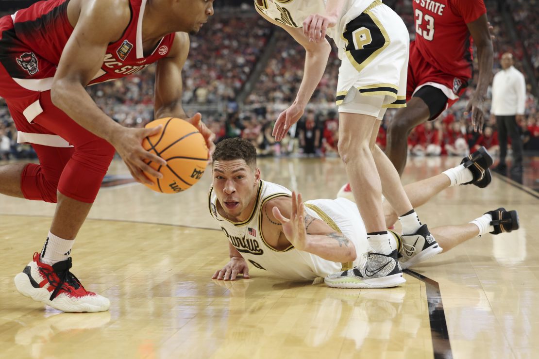 Gillis dives after a loose ball in the second half of the Final Four game against North Carolina State.