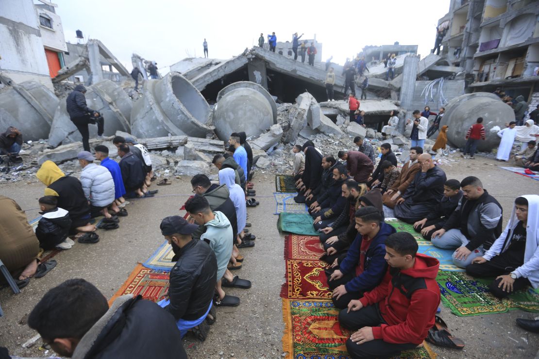 Muslims conduct Eid prayers at the destroyed Al-Farouq Mosque in Rafah.