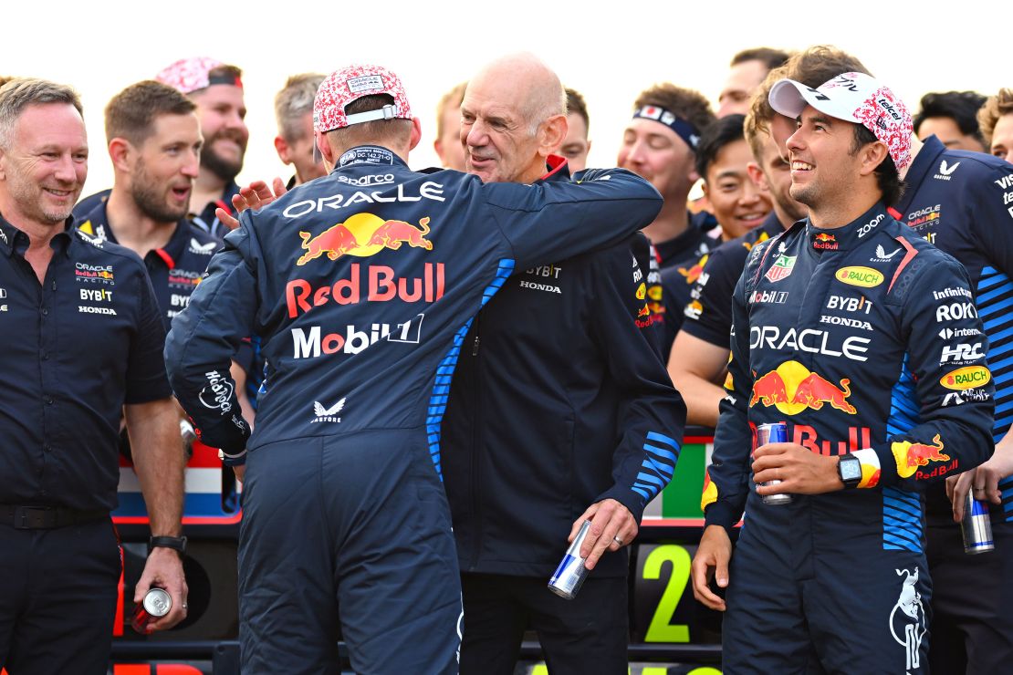 Newey (middle) is hugged by Max Verstappen after the Dutch driver won the 2024 Japanese Grand Prix.