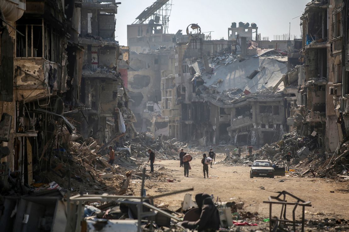 Former residents retrieve belongings from their homes in Khan Younis, Gaza, on April 7, 2024.