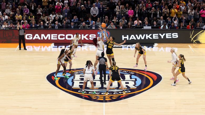 Kamilla Cardoso #10 of the South Carolina Gamecocks and Hannah Stuelke #45 of the Iowa Hawkeyes jump for the tip in the 2024 NCAA Women's Basketball Tournament National Championship at Rocket Mortgage FieldHouse on April 07, 2024 in Cleveland, Ohio. South Carolina beat Iowa 87-75.