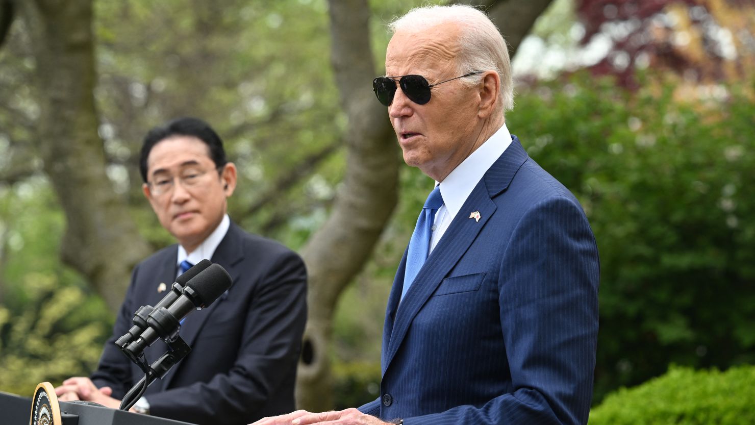 US President Joe Biden (R) and Japanese Prime Minister Fumio Kishida hold a joint press conference in the Rose Garden of the White House in Washington, DC, April 10, 2024.