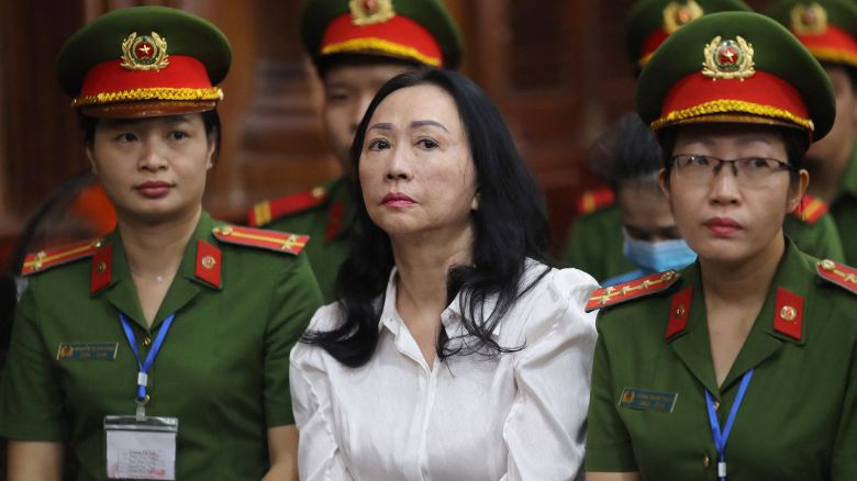 Vietnamese property tycoon Truong My Lan (C) looks on at a court in Ho Chi Minh city on April 11, 2024. A top Vietnamese property tycoon could face the death penalty when she and dozens of other co-accused face verdicts on April 11 in one of the country's biggest fraud cases over the embezzlement of USD 12.5 billion. (Photo by AFP) (Photo by STR/AFP via Getty Images)