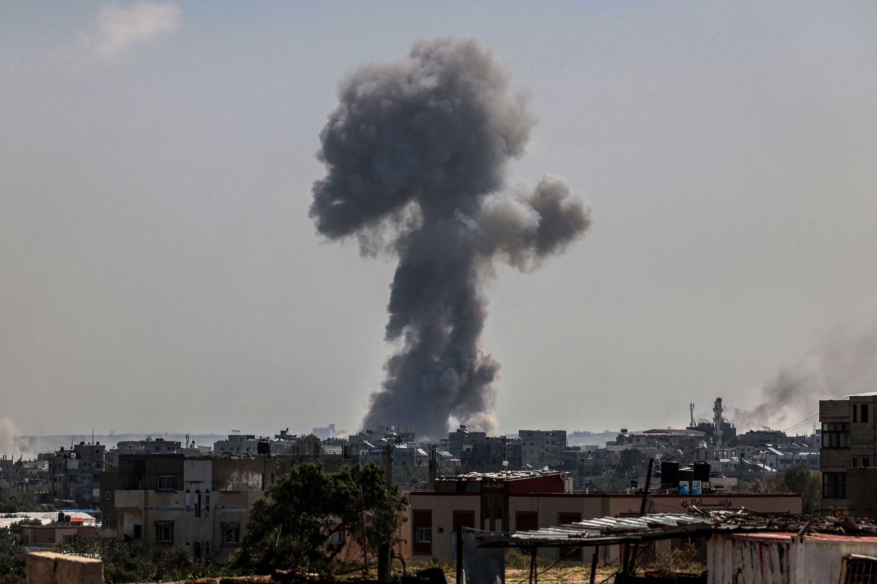 A billow of smoke rises following Israeli bombardment in Nuseirat, in central Gaza, on Friday.
